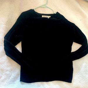 Womens black cable knit sweater.